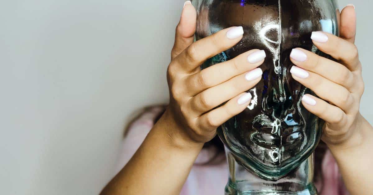 pexels-designecologist-905894 (1) fake face hiding showing imposter syndrome
